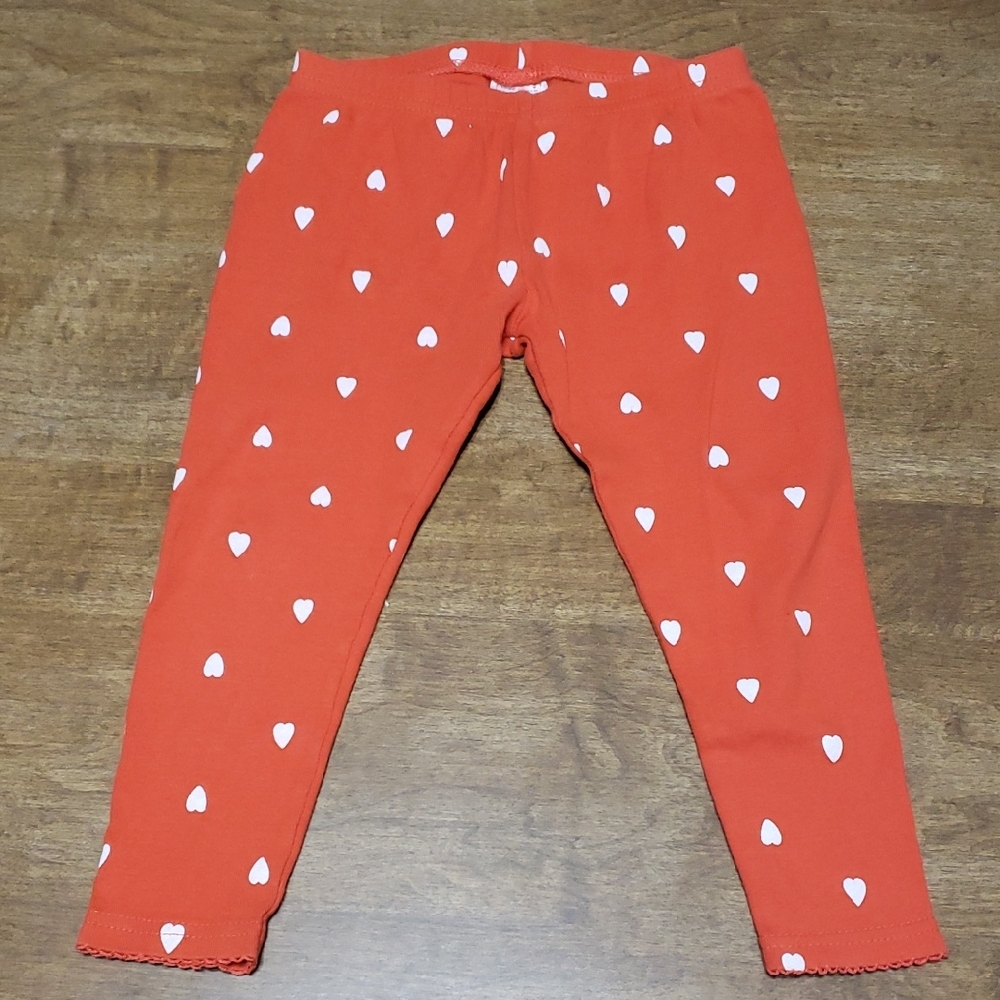Carter's Baby Girl Cotton Stretch Leggings in Red with a White Heart Print. 